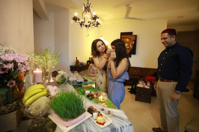 Navroz celebrations by a Zoroastrian family at their home (contributed by Mr Mobedji).