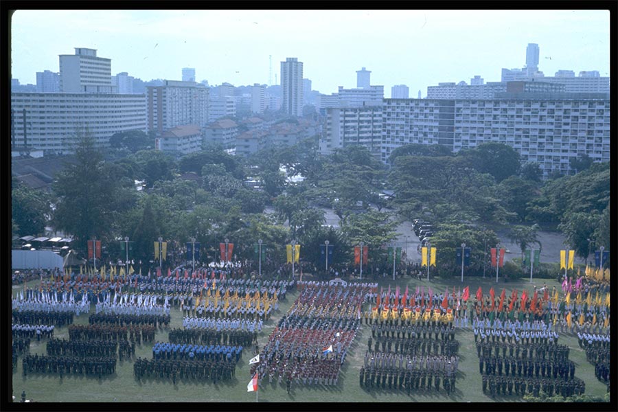 <strong>Photograph of the National Day Parade held at Tiong Bahru Secondary School in 1977<br>
</strong>Reproduction<br>
9 August 1977<br>
Ministry of Information and the Arts Collection<br>
Courtesy of the National Archives of Singapore